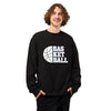Mannequin homme de face portant le sweat noir oversize Basketball, mains dans les poches, sur fond blanc